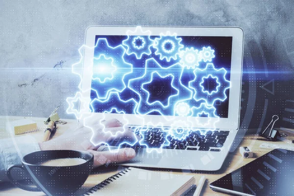 Double exposure of businessman working on laptop on background. International business hologram in front. Concept of success. — Stock Photo, Image