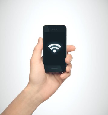 Kablosuz ağ sembollü cep telefonu. Teknoloji ve iletişim konsepti.