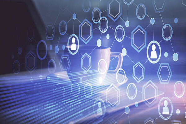 Computer on desktop with social network hologram. Multi exposure. Concept of international people connections.