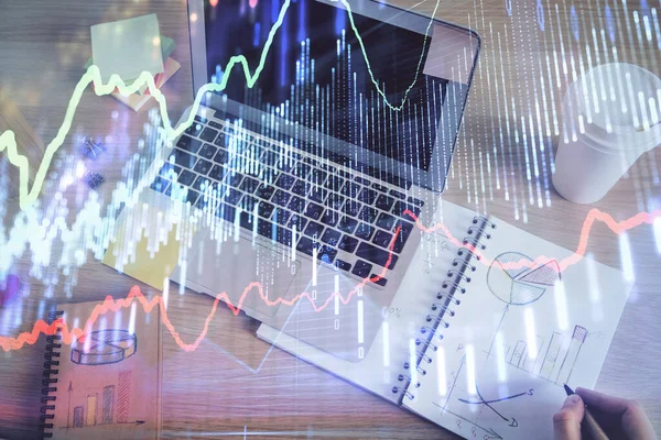 Double exposure of mans hands writing notes of stock market with forex chart. — Stock Photo, Image