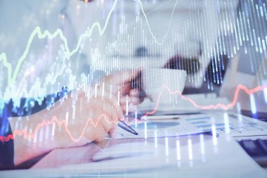 Borsa grafiği ile çift pozlama elleri.