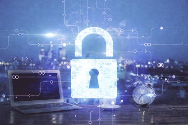 Bilgisayar ve ikon hologramı ile masaüstüne çift pozlama. Veri güvenliği kavramı.