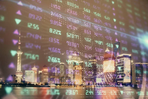 Financial graph on night city scape with tall buildings background double exposure. Analysis concept.