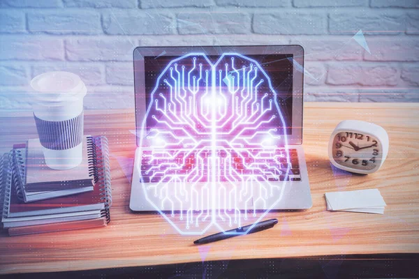 Double exposure of table with computer and brain hologram. Data innovation concept.