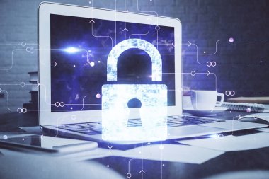 Bilgisayar ve ikon hologramı ile masaüstüne çift pozlama. Veri güvenliği kavramı.