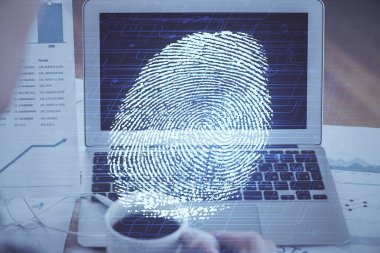 Ofisteki bilgisayarın parmak izi çizimi. Çifte maruziyet. İş veri güvenliği kavramı.