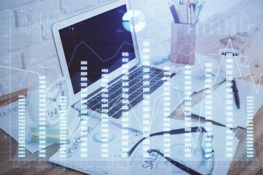 Finansal grafik renkli çizimler ve arka planda bilgisayar olan tablolar. Çoklu maruz kalma. Uluslararası pazarlar kavramı.