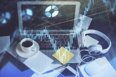 Finansal pazar grafiği hologramı ve kişisel bilgisayar arka planda. Çifte maruziyet. Önx kavramı.