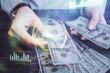 Teknolojinin iki katına çıkması hologram, dolar banknotları ve insan eli. Veri kavramı