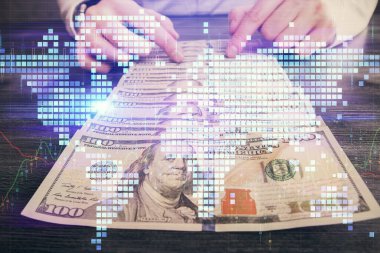Finansal temaya çok fazla maruz kalma hologram, Amerikan dolarları ve erkek eli. İş konsepti.