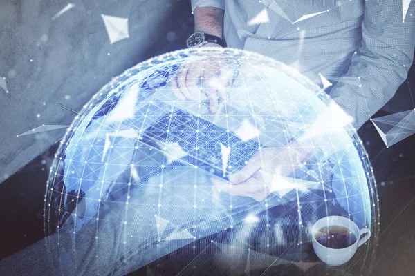 Double exposure of businessman working on laptop on background. International business hologram in front. Concept of success. — Stock Photo, Image