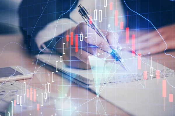 A woman hands writing information about stock market in notepad. Forex chart holograms in front. Concept of research. Multi exposure — Stock Photo, Image