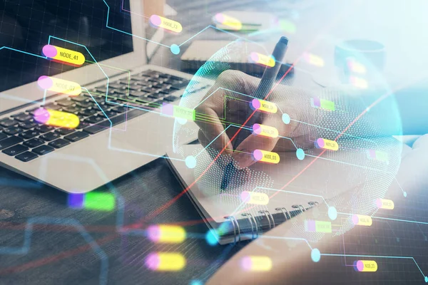 Doble exposición de las manos haciendo notas con el holograma del mapa del mundo y los iconos del tema de datos. Concepto de datos informáticos globales. —  Fotos de Stock