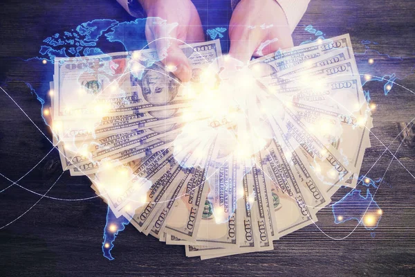 Multi exposure of financial theme drawing hologram and USA dollars bills and man hands. Business concept. — Stock Photo, Image