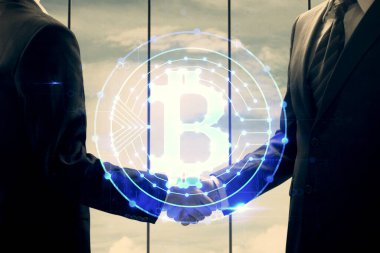 Zincirleme holograma çifte maruz kalma ve iki adamın el sıkışması. Kripto iş konsepti.