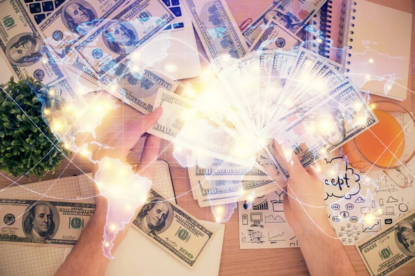 Multi exposure of financial theme drawing hologram and USA dollars bills and man hands. Business concept. — Stock Photo, Image