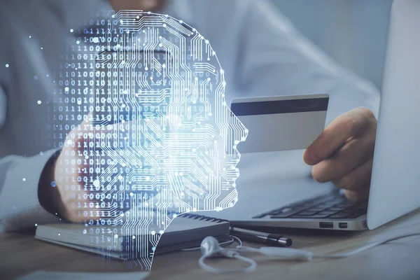 Doble exposición de las manos del hombre escribiendo en el ordenador con tarjeta de crédito y el dibujo del tema del cerebro. Concepto de comercio electrónico e IA. —  Fotos de Stock