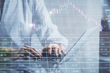 Bilgisayarda ve ön x grafik hologram çiziminde kadın eli yazarken çift pozlama. Borsa yatırım kavramı.