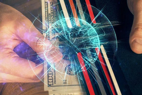 Wielokrotna ekspozycja tematu finansowego rysunek hologram i USA dolarów rachunków i rąk człowieka. Koncepcja przedsiębiorstwa. — Zdjęcie stockowe