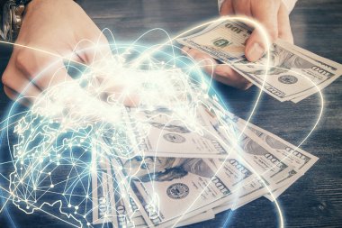 Finansal temaya çok fazla maruz kalma hologram, Amerikan dolarları ve erkek eli. İş konsepti.