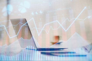 Grafik ve finansal bilgilere çifte maruz kalma ve bilgisayar geçmişi olan çalışma alanı. Uluslararası çevrimiçi ticaret kavramı.