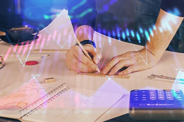 Doble exposición del hombre escribiendo en papel con gráfico de divisas . —  Fotos de Stock