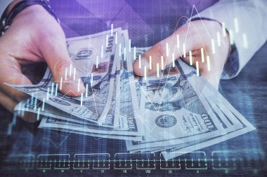 Finansal grafiğe çoklu pozlama hologram, Amerikan dolarları ve insan eli. Analiz kavramı.