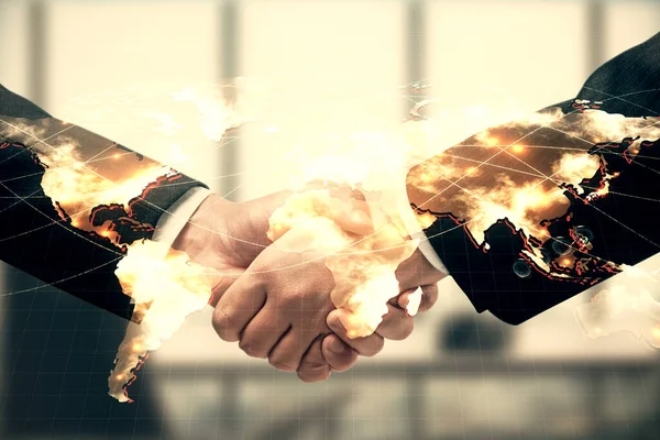 Двойная экспозиция деловой тематической голограммы и рукопожатие двух мужчин. Концепция успеха. — стоковое фото