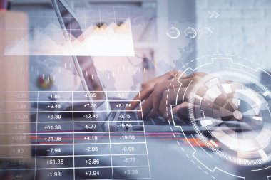 Bilgisayarda ve ön x grafik hologram çiziminde kadın eli yazarken çift pozlama. Borsa yatırım kavramı.