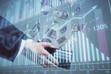 Finansal grafiğe çoklu pozlama hologram, Amerikan dolarları ve insan eli. Analiz kavramı.