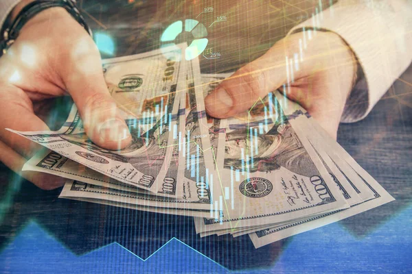 Expunerea multiplă a hologramei grafice financiare și a bancnotelor de dolari americane și a mâinilor omului. Conceptul de analiză . — Fotografie, imagine de stoc