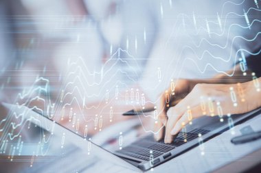 Bilgisayarda ve ön x grafik hologram çiziminde kadın eli yazarken çift pozlama. Borsa yatırım kavramı.