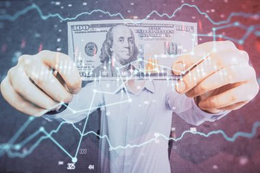 Finansal grafiğe çoklu pozlama hologram, Amerikan dolarları ve insan eli. Analiz kavramı.
