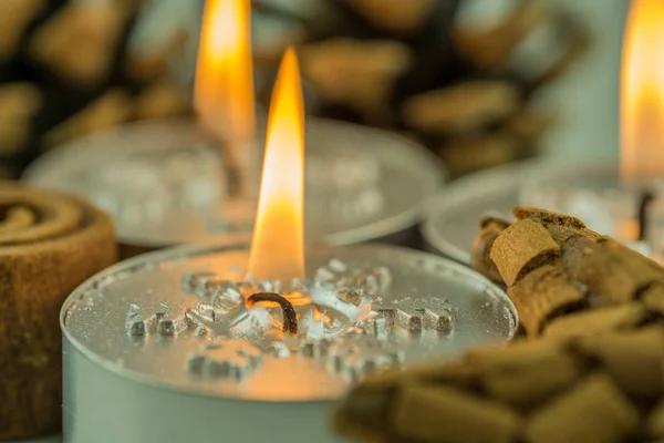 Burning candles with Christmas motifs and accessories — Stock Photo, Image