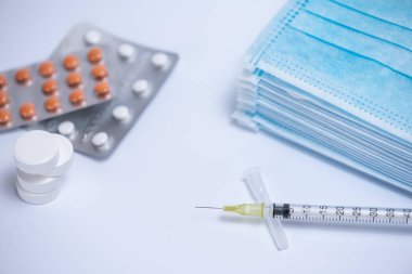 medicines, injection and face masks, pills. 2019-CoCo Coronavirus. New Coronavirus, Middle Eastern Respiratory Syndrome. Chinese coronavirus outbreak. Pandemic virus protection concept.