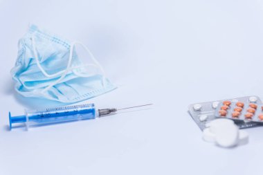 medicines, injection and face masks, pills. 2019-CoCo Coronavirus. New Coronavirus, Middle Eastern Respiratory Syndrome. Chinese coronavirus outbreak. Pandemic virus protection concept.