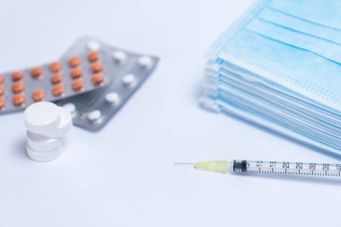 medicines, injection and face masks, pills. 2019-CoCo Coronavirus. New Coronavirus, Middle Eastern Respiratory Syndrome. Chinese coronavirus outbreak. Pandemic virus protection concept.