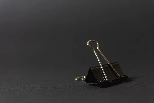 paper clip - binder on a dark background
