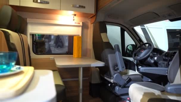 The interior of the expensive campers. A large fair luxury motorhome, caravanning, motoring and tourism trade Caravan 2017 in Expocentre Messukeskus. — Stock Video