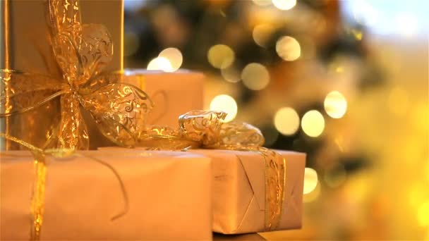 Christmas theme. Gifts, lights, Christmas tree. — Stock Video