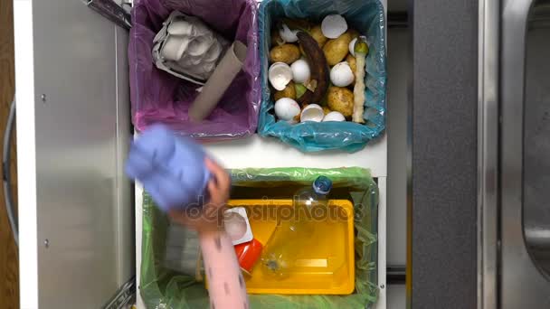 Mom Shows Your Child How To Sort Waste. Slow Motion. — Stock Video
