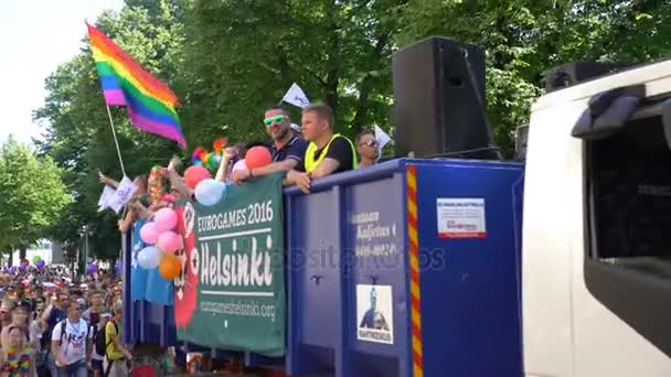 Thousands of people in solidarity during a Gay pride parade on the streets. — Stock Video