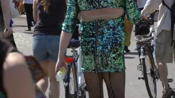 Participants in the Drag Queen competition in colorful costumes. Gay pride parade on the streets of Helsinki. — Stock Video