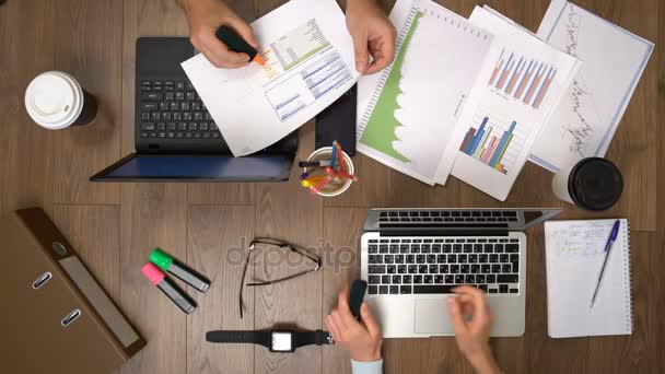 Business team working together at desk. Top view. — Stock Video