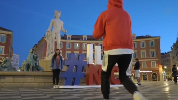 Fountain du Soleil with a marble statue of Apollo adorned with the installation of hashtag I love nice — Stock Video