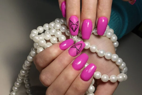 Pink nail design with decoration — Stock Photo, Image