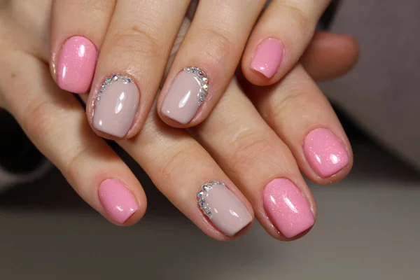 Beautiful light pink nails with rhinestones, manicure design
