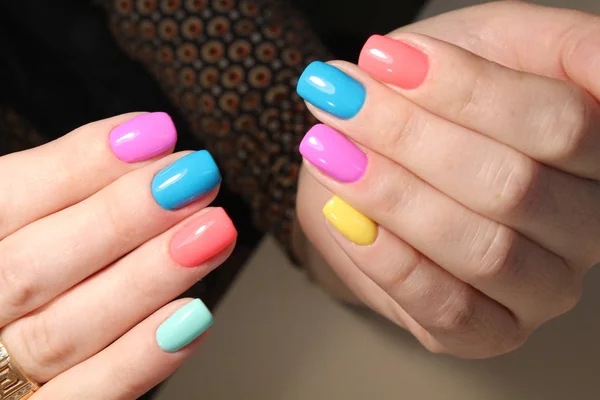 Bright multi-colored design of manicure — Stock Photo, Image