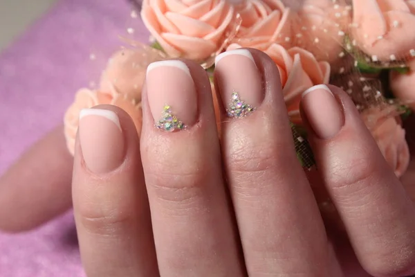 Manicure design French with rhinestones