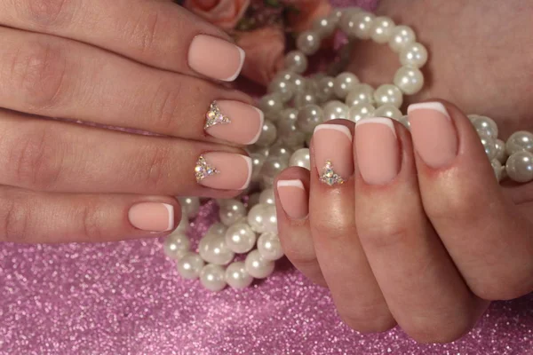 Manicure design French with rhinestones